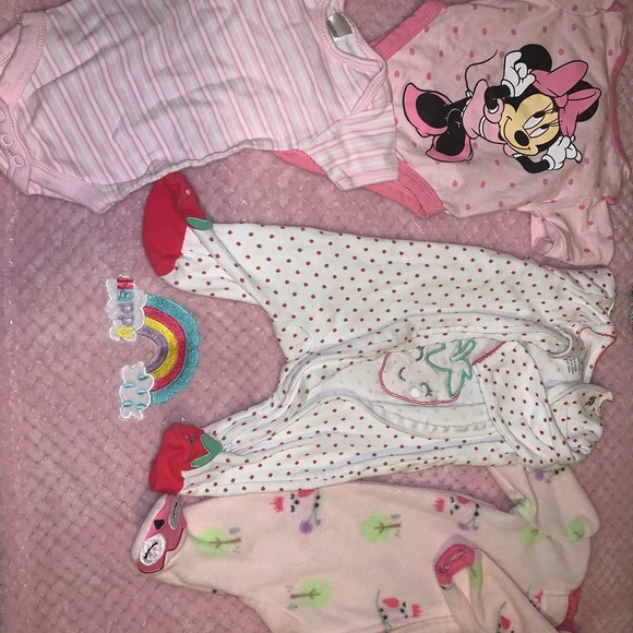Baby sleepers and onsies. Sizes range from newborn - Picture 6 of 7